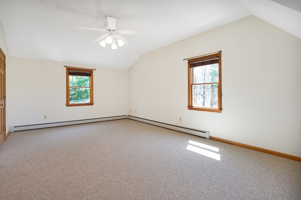 20 Upper Hampden Road Monson, MA 01057 - Photo 18 of 39 an empty room with windows and ceiling fan