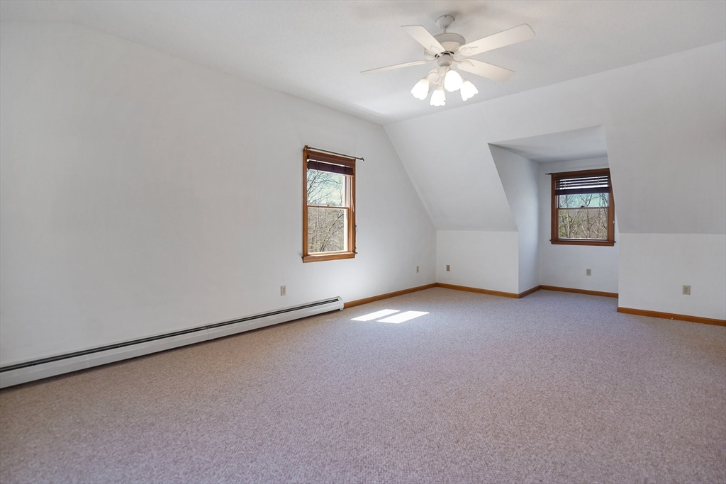 20 Upper Hampden Road Monson, MA 01057 - Photo 19 of 39 an empty room with windows and fan