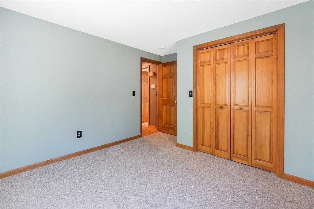 20 Upper Hampden Road Monson, MA 01057 - Photo 21 of 39 a view of an empty room with wooden door