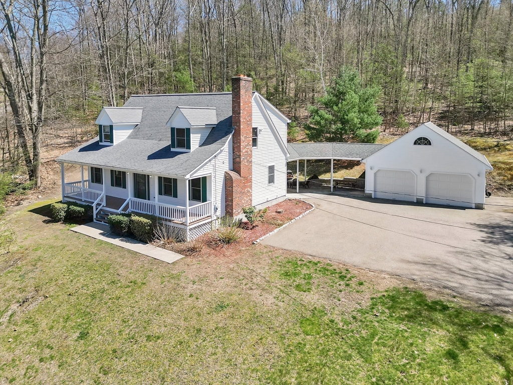 20 Upper Hampden Road Monson, MA 01057 - Photo 3 of 39 a view of a house with a yard and sitting area