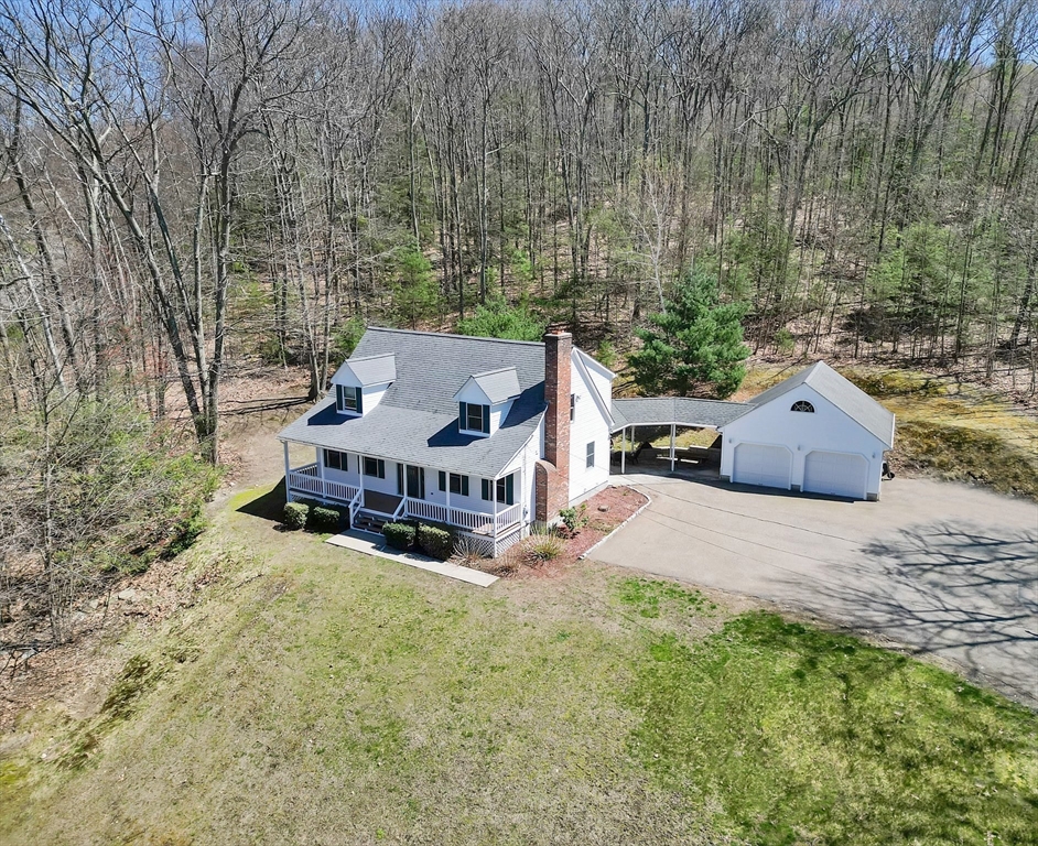 20 Upper Hampden Road Monson, MA 01057 - Photo 36 of 39 a view of a house with a yard and sitting area