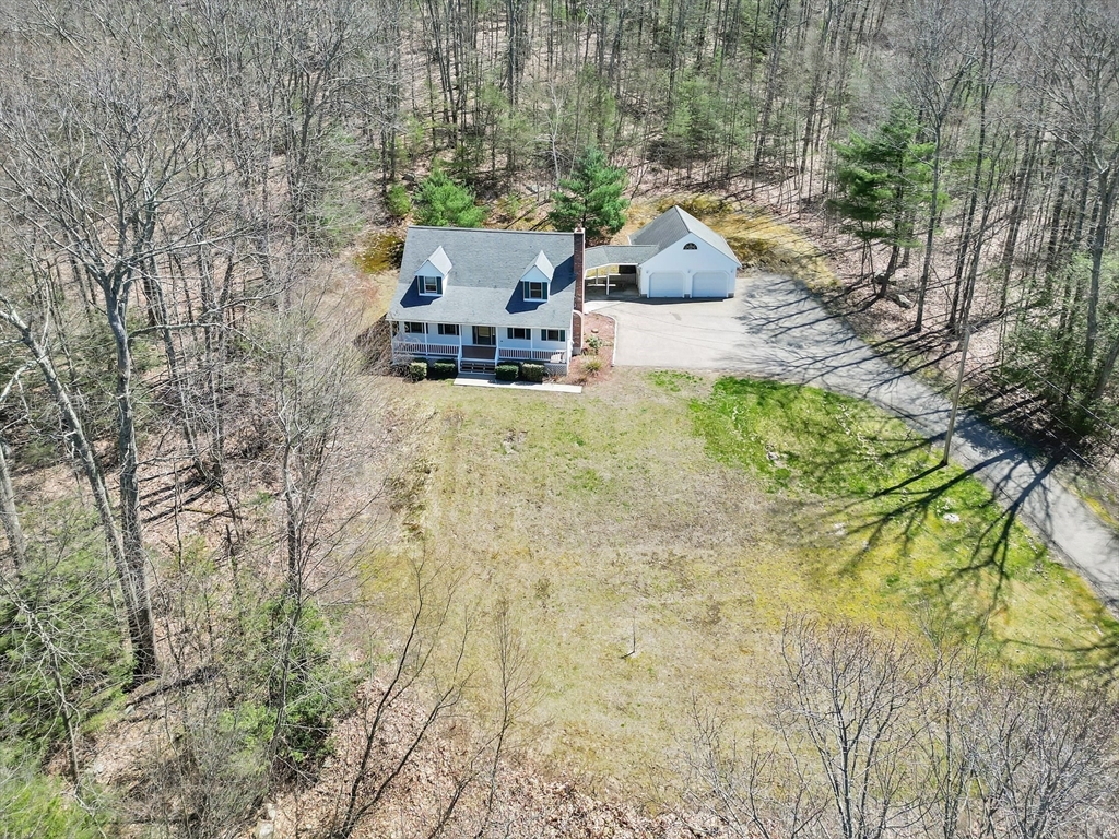 20 Upper Hampden Road Monson, MA 01057 - Photo 37 of 39 a backyard of a house with table and chairs