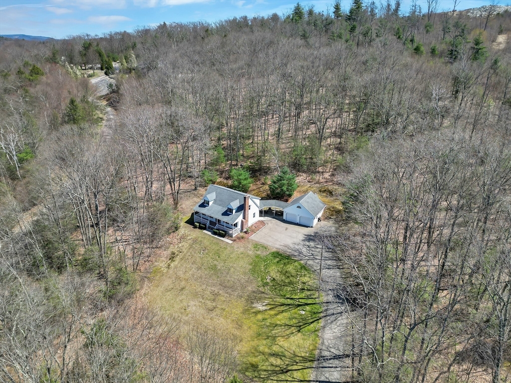 20 Upper Hampden Road Monson, MA 01057 - Photo 38 of 39 a backyard of a house with table and chairs
