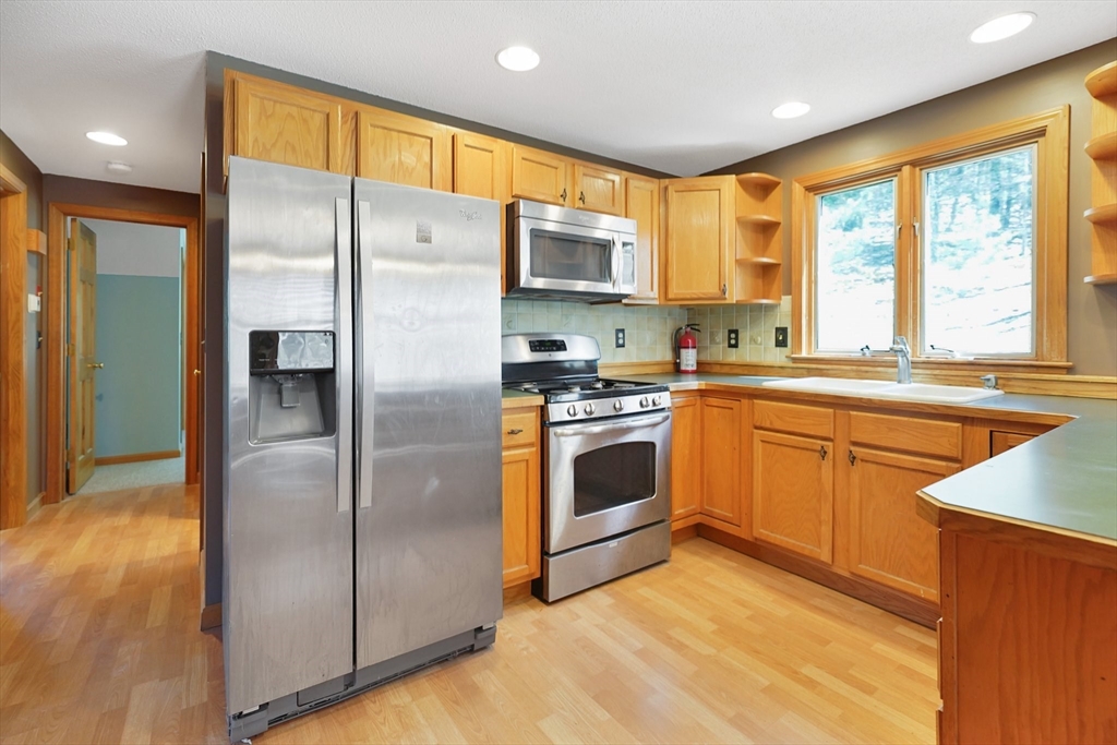 20 Upper Hampden Road Monson, MA 01057 - Photo 6 of 39 a kitchen with stainless steel appliances a refrigerator sink and cabinets