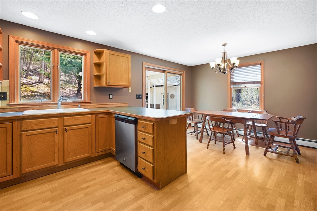 20 Upper Hampden Road Monson, MA 01057 - Photo 9 of 39 a kitchen with lots of counter top space and dining table