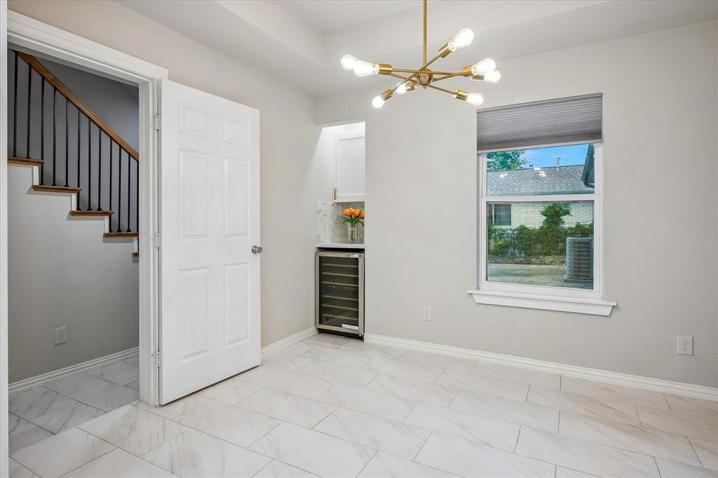 2001 Pebblebrook Trail Irving, TX 75060 - Photo 12 of 40 The breakfast area has views and also a Beverage Fridge and Counter for morning coffee!