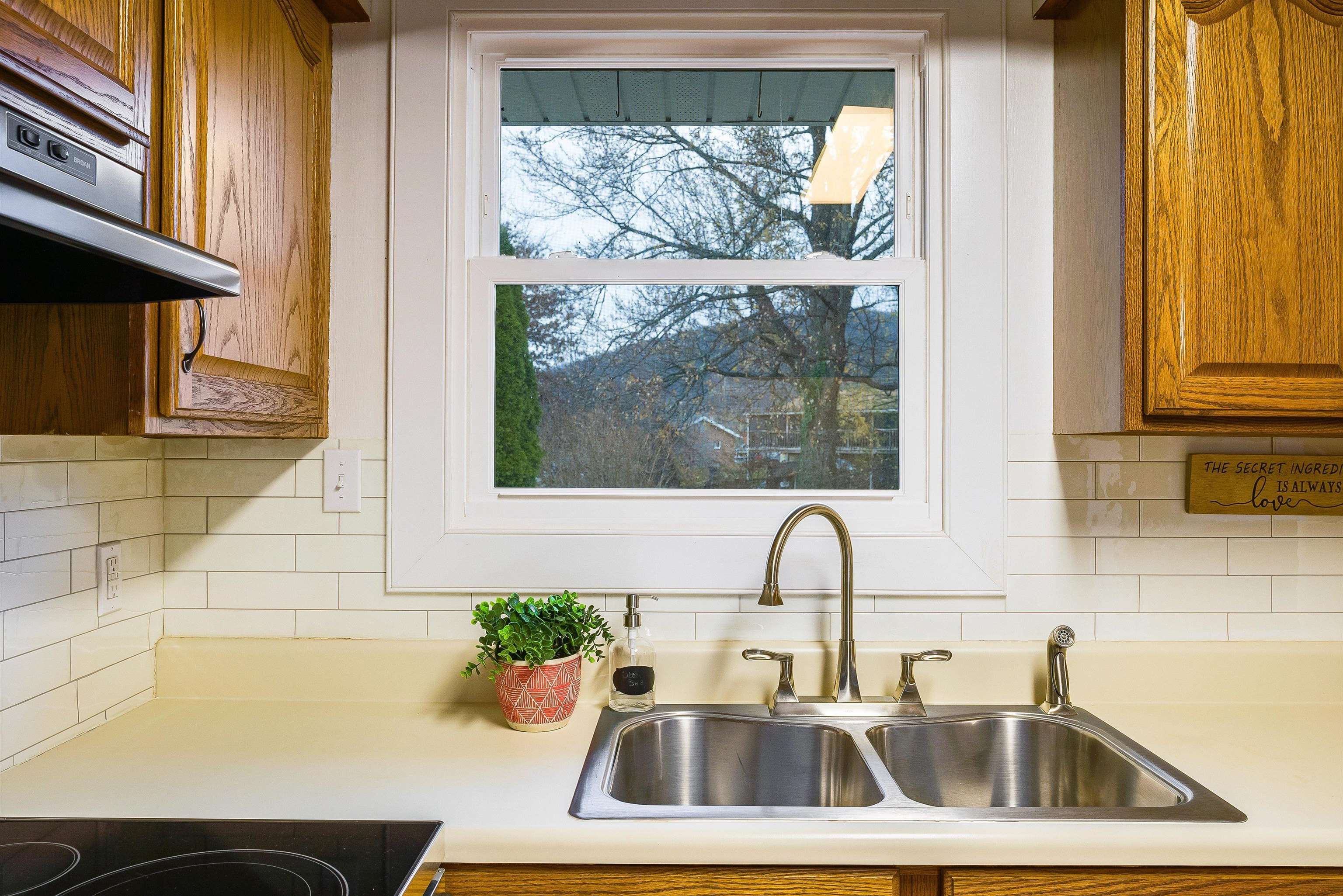 815 Rutherford Street Staunton, VA 24401 - Photo 15 of 56 a kitchen with a sink and a window