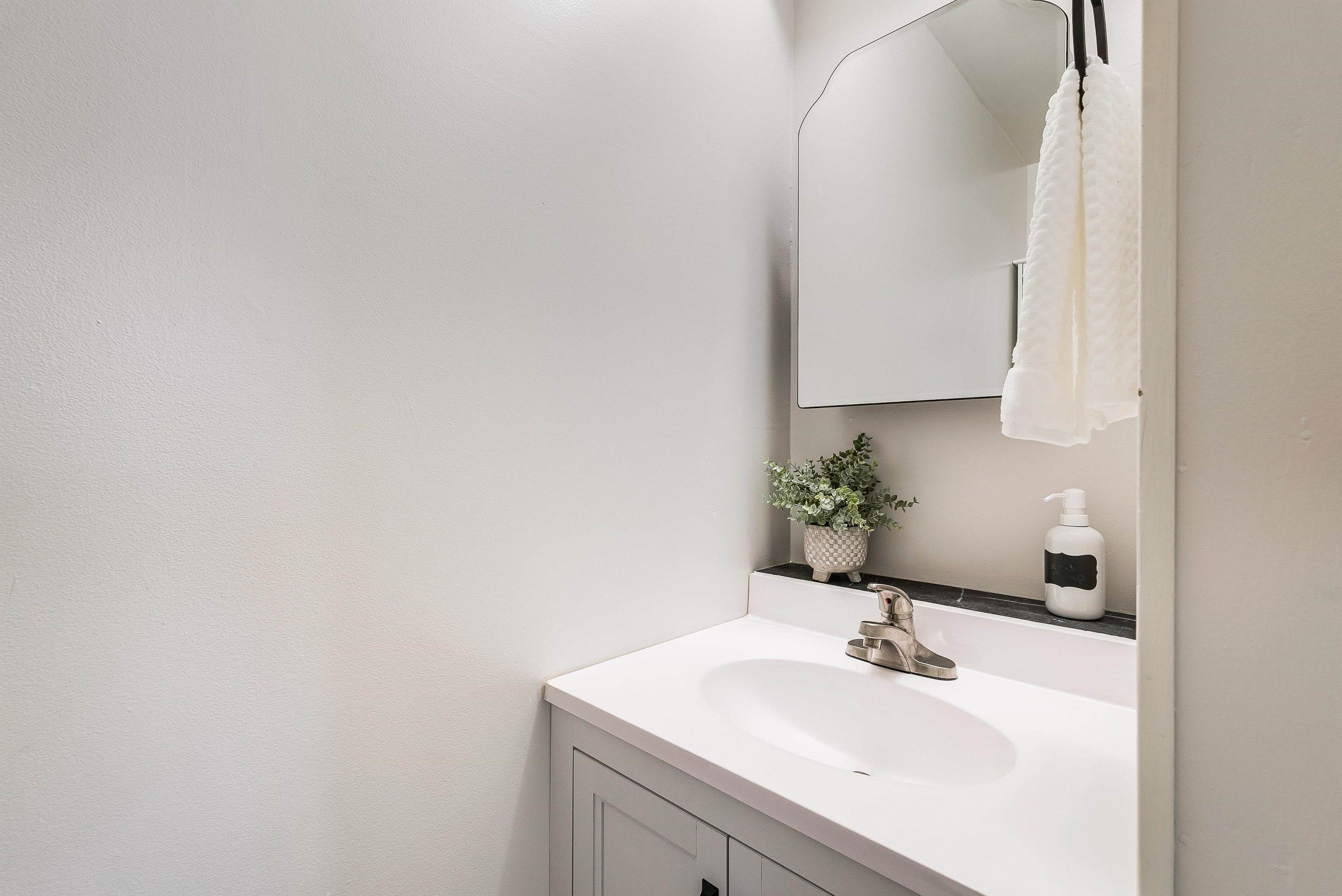815 Rutherford Street Staunton, VA 24401 - Photo 25 of 56 a bathroom with a sink and a mirror