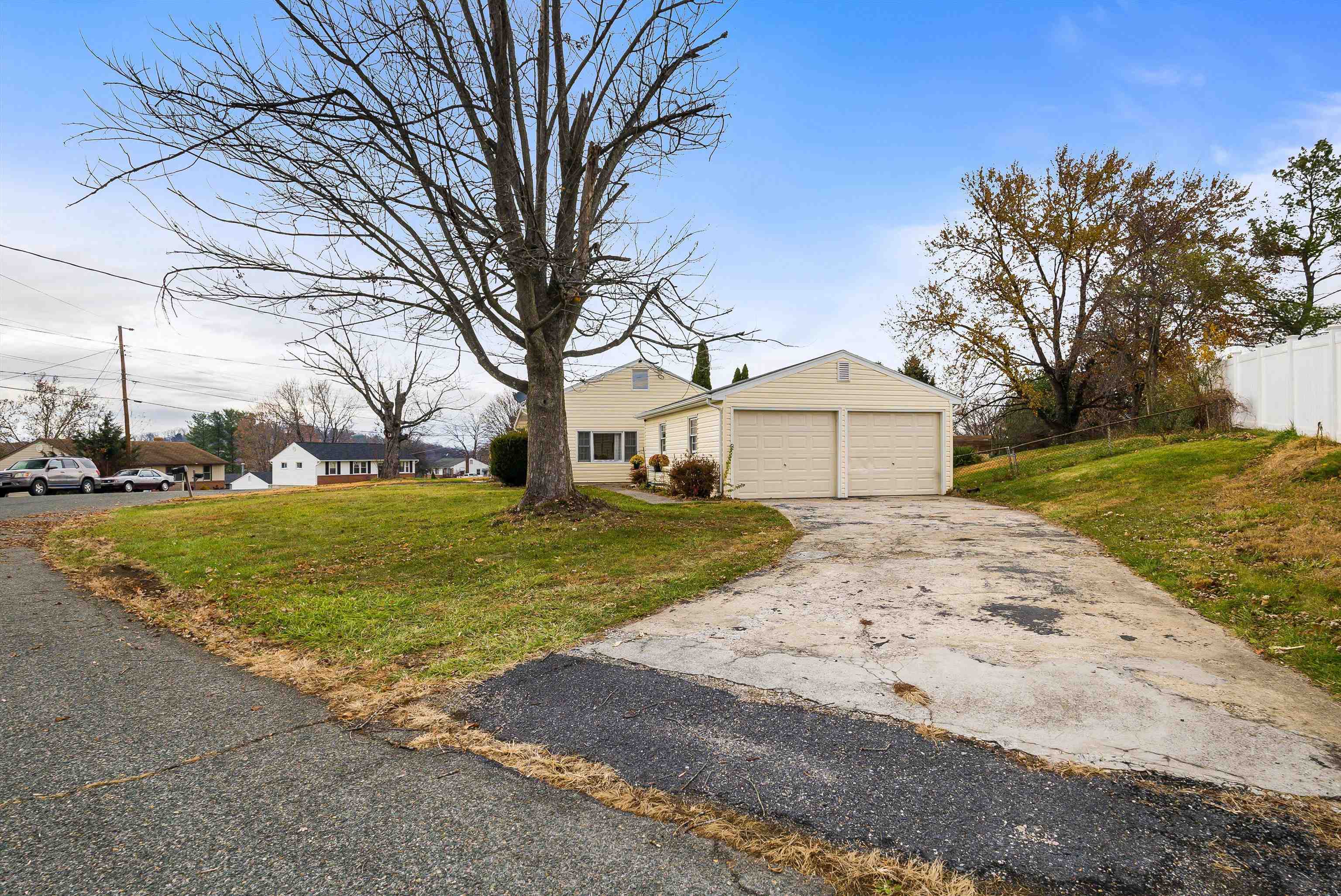 815 Rutherford Street Staunton, VA 24401 - Photo 30 of 56 a front view of a house with a yard and garage