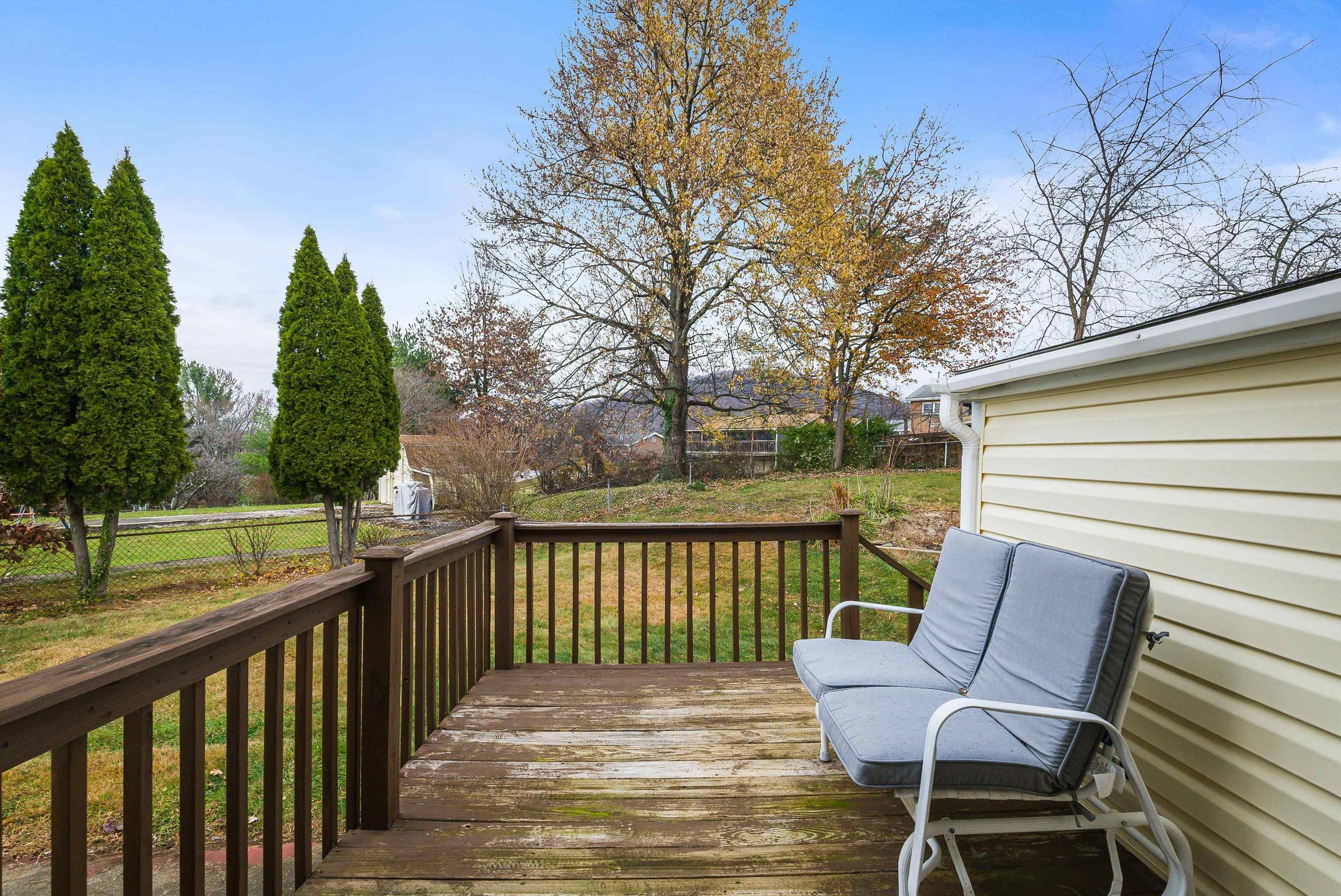 815 Rutherford Street Staunton, VA 24401 - Photo 36 of 56 a view of a two chairs in the deck next to a yard