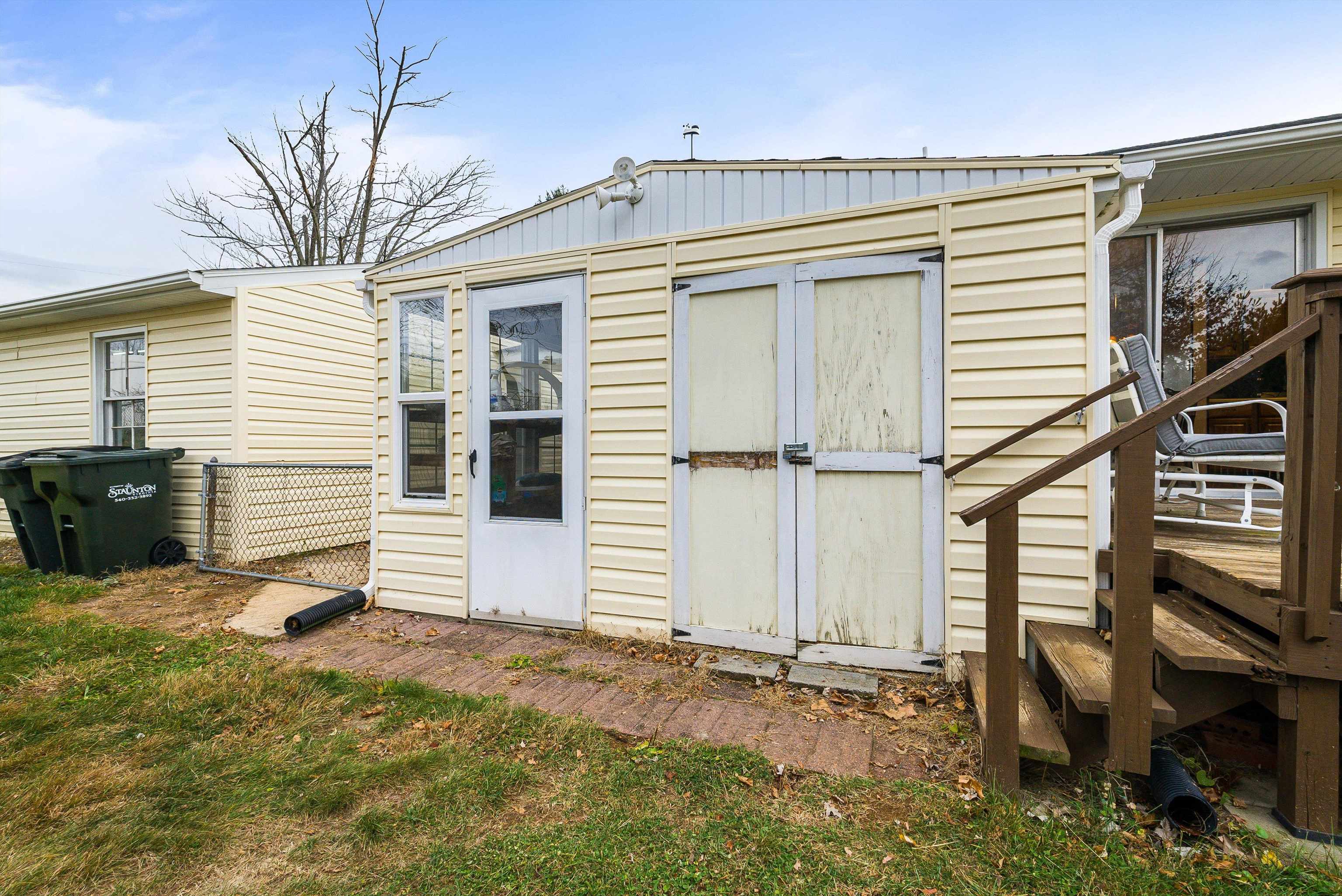 815 Rutherford Street Staunton, VA 24401 - Photo 38 of 56 a view of a house with backyard and garage