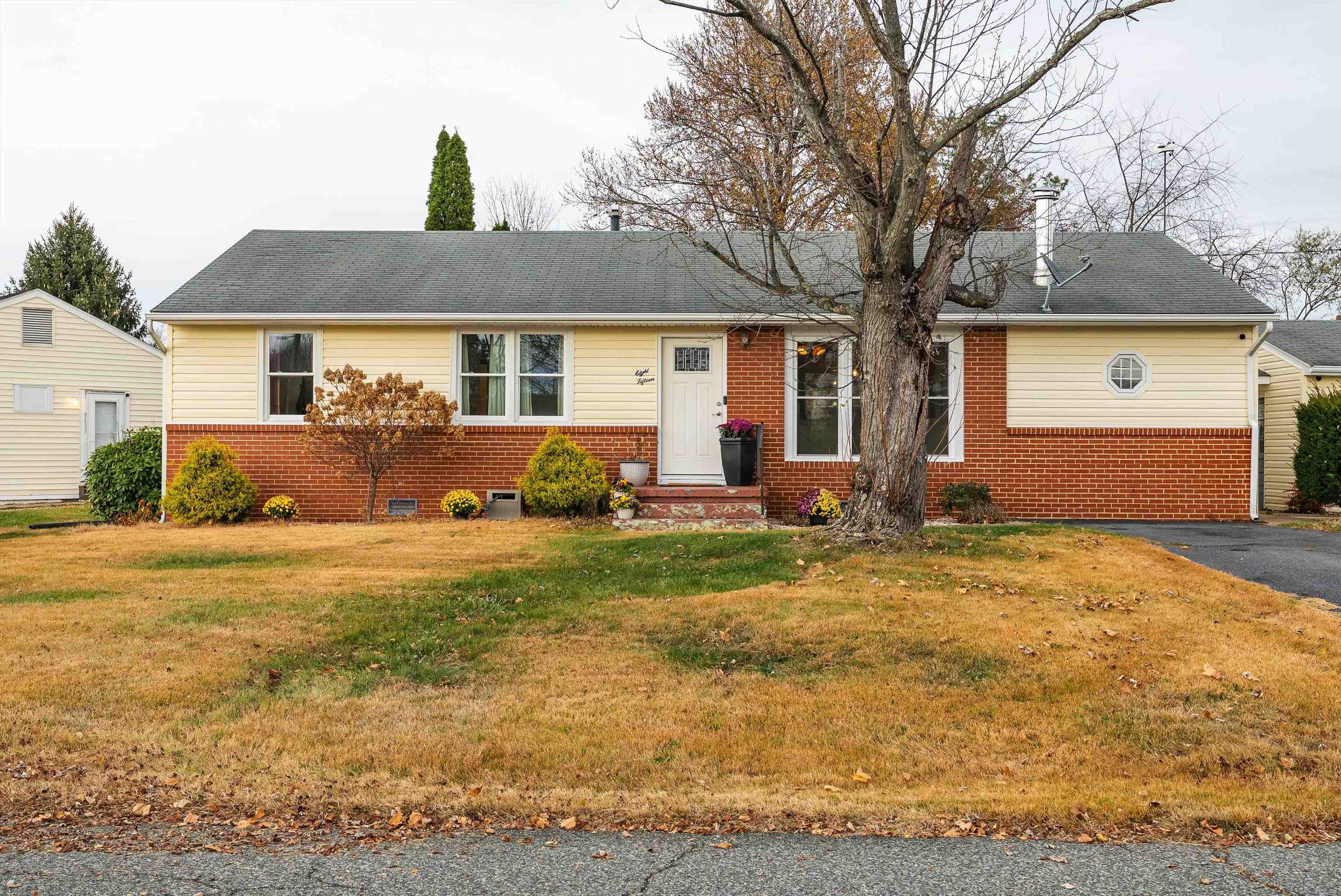 815 Rutherford Street Staunton, VA 24401 - Photo 39 of 56 a front view of house with yard and trees in the background