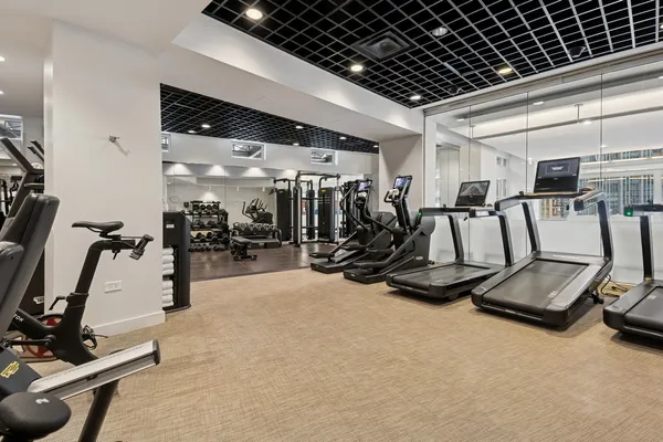 a view of a room with gym equipment