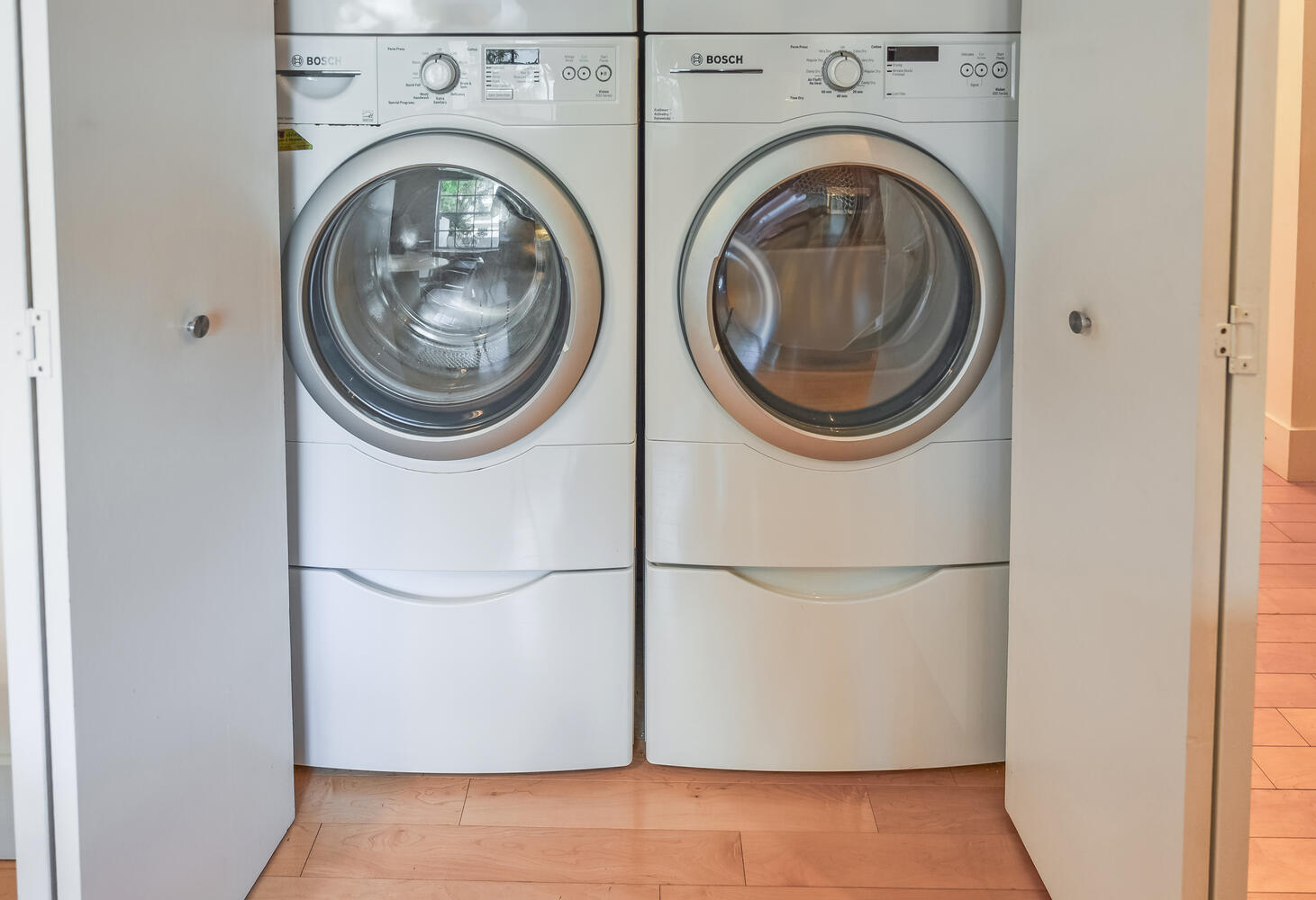 7369 Orangewood Lane, Unit 108 Boca Raton, FL 33433 - Photo 17 of 66 a utility room with dryer and washer