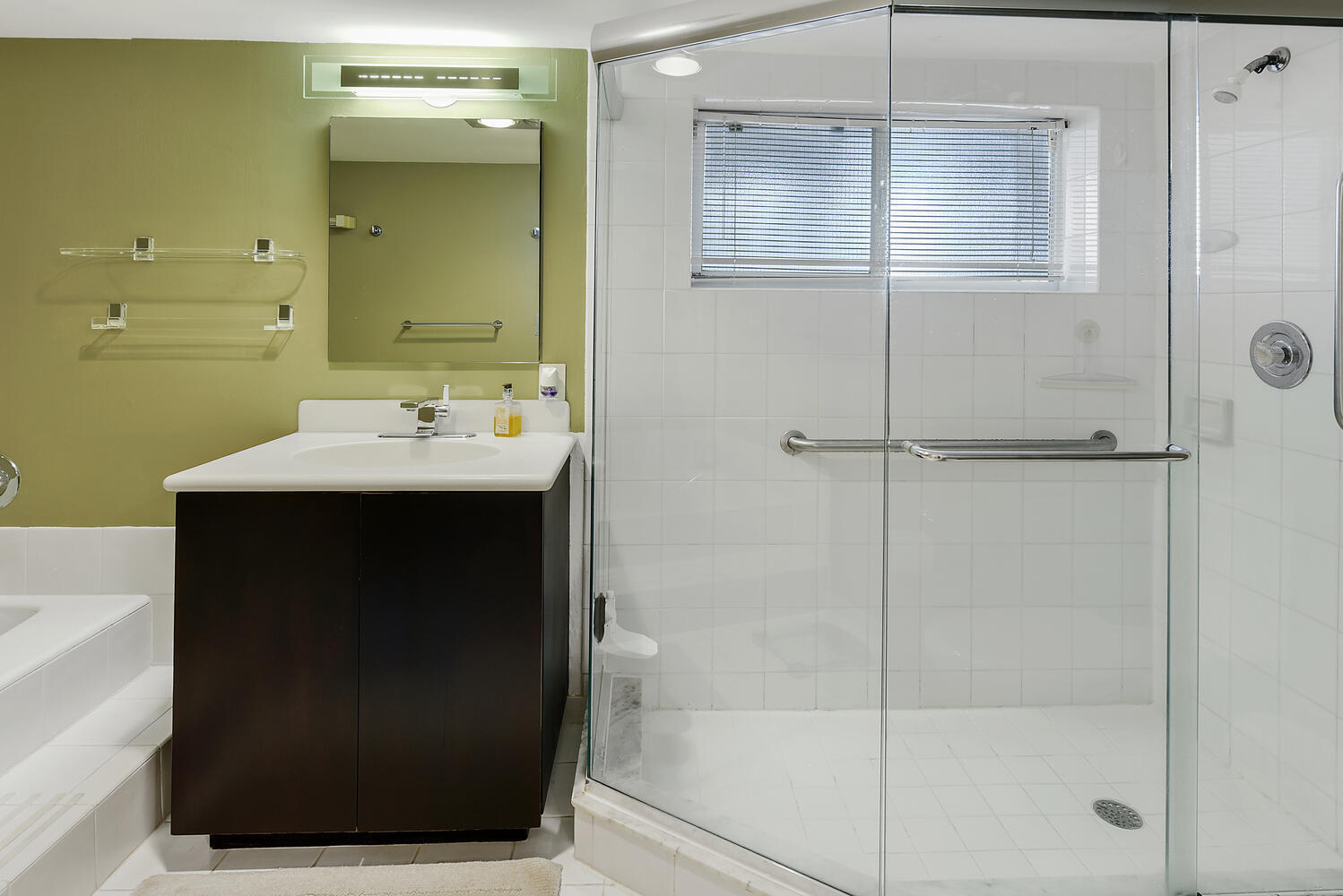 7369 Orangewood Lane, Unit 108 Boca Raton, FL 33433 - Photo 21 of 66 a bathroom with a sink and mirror