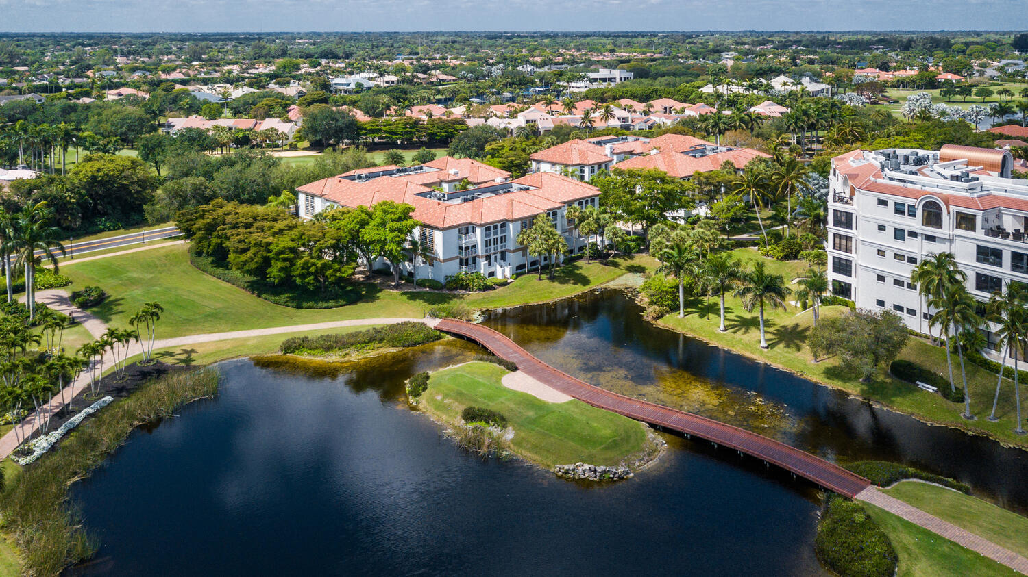 7369 Orangewood Lane, Unit 108 Boca Raton, FL 33433 - Photo 40 of 66 an aerial view of residential houses with outdoor space and swimming pool