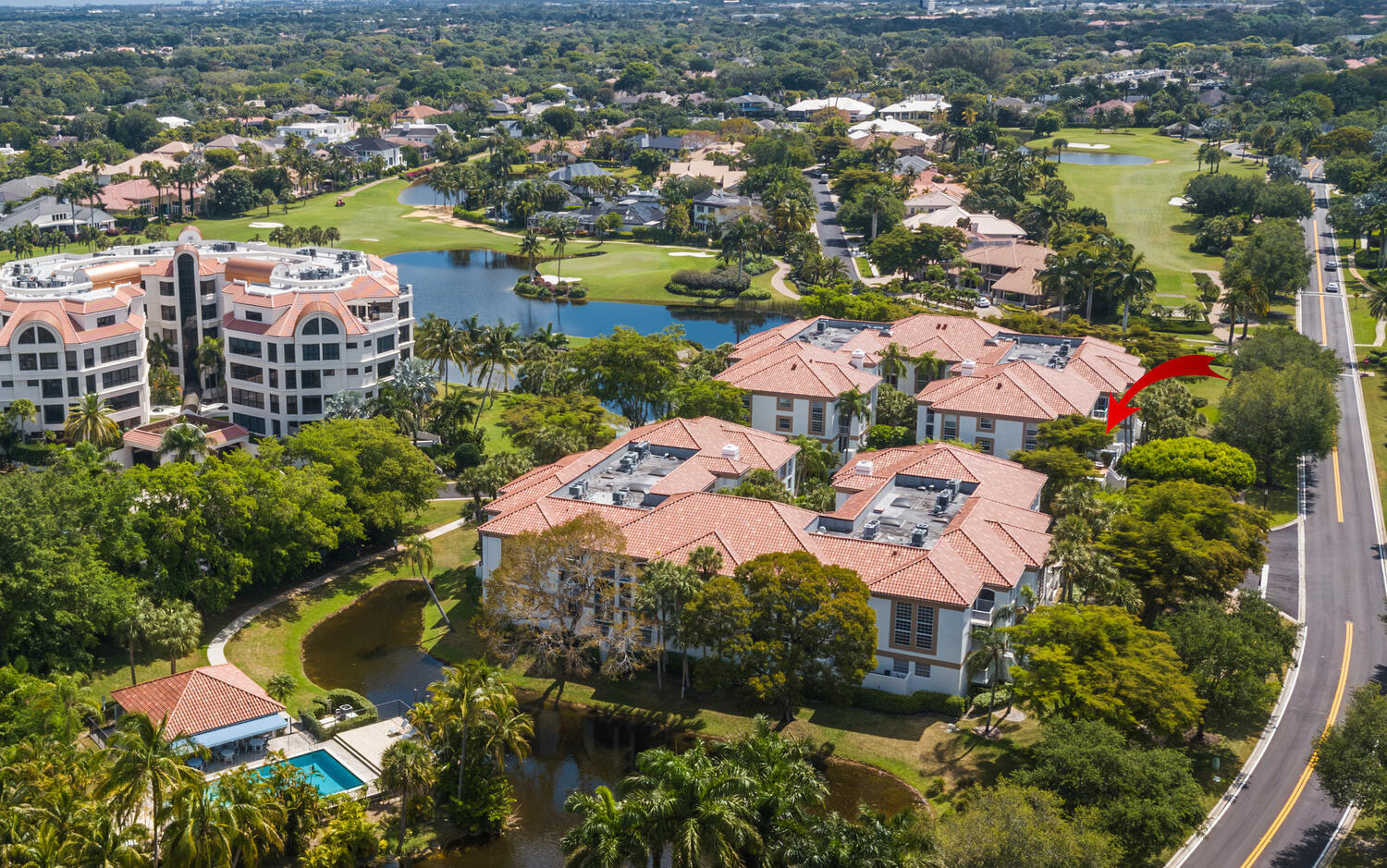 7369 Orangewood Lane, Unit 108 Boca Raton, FL 33433 - Photo 44 of 66 an aerial view of residential houses with outdoor space and river