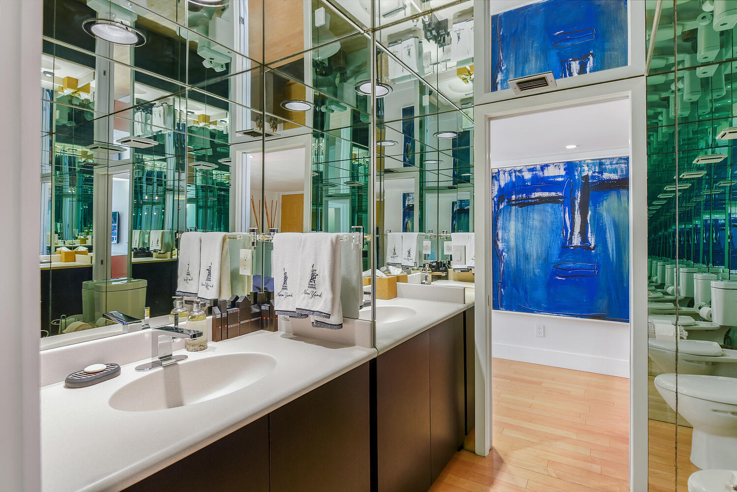 7369 Orangewood Lane, Unit 108 Boca Raton, FL 33433 - Photo 7 of 66 a bathroom with a sink and a mirror