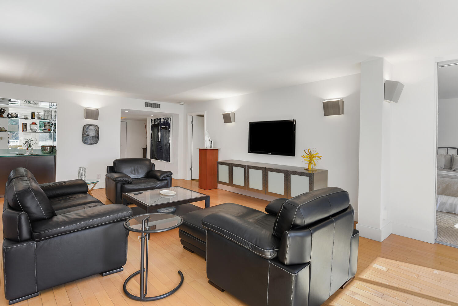 7369 Orangewood Lane, Unit 108 Boca Raton, FL 33433 - Photo 9 of 66 a living room with furniture and a flat screen tv