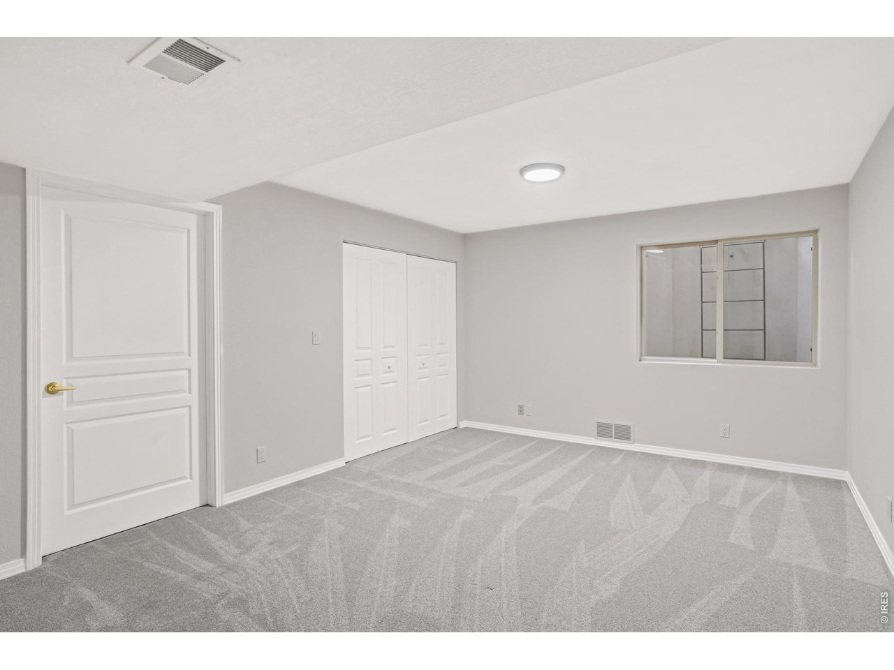 926 Hover Ridge Circle Longmont, CO 80501 - Photo 23 of 31 Basement bedroom/rec room