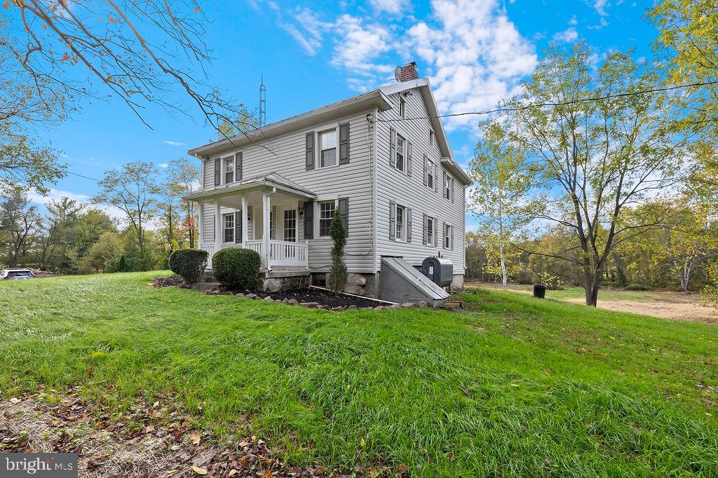 2860 Mayberry Road Taneytown, MD 21787 - Photo 19 of 31 a view of a house with a yard porch and sitting area