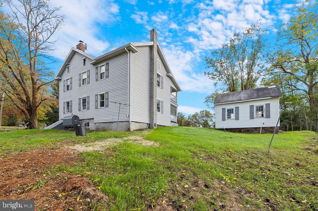 2860 Mayberry Road Taneytown, MD 21787 - Photo 20 of 31 a white house that has a tree in front of it