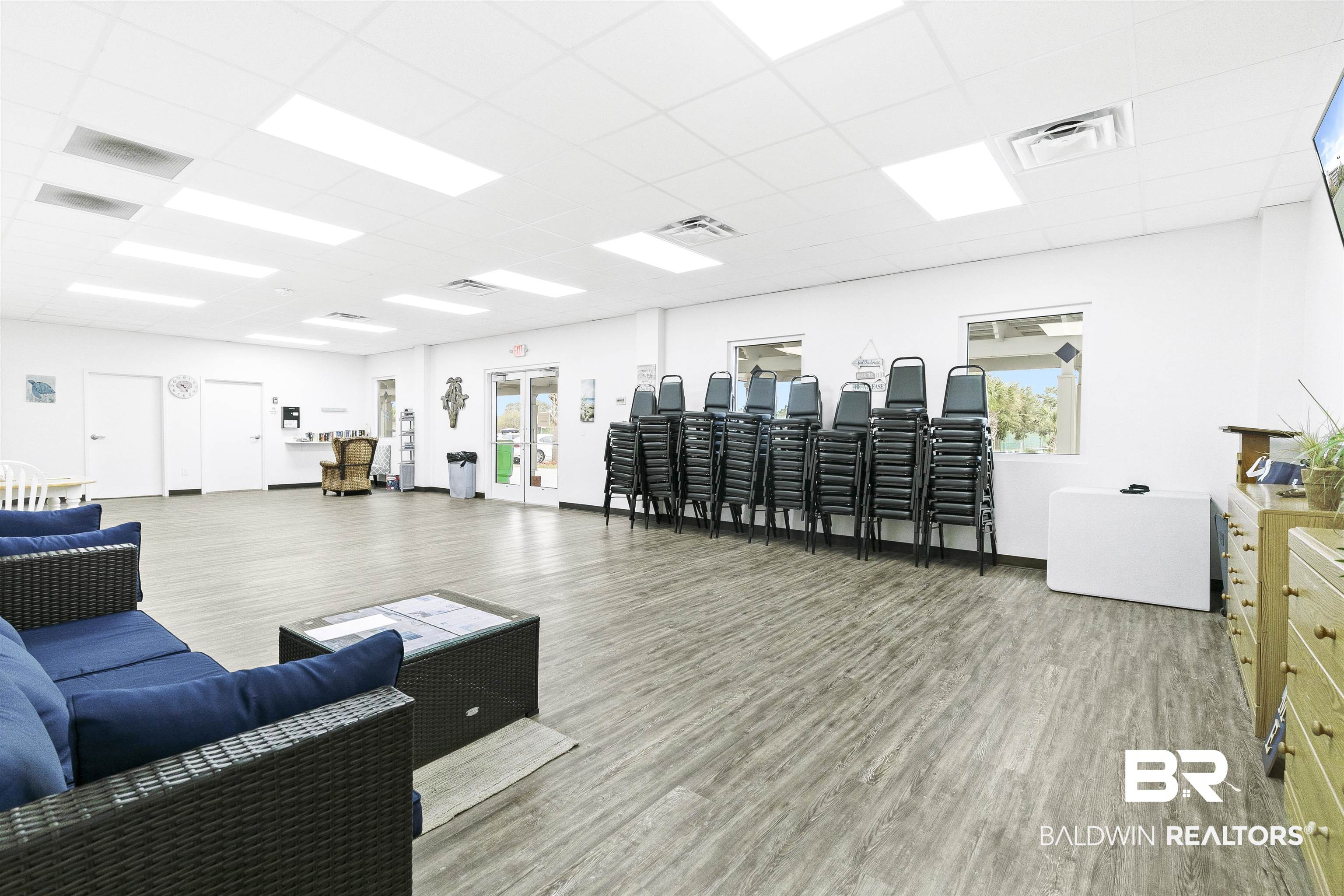 400 Plantation Road, Unit 3314 Gulf Shores, AL 36542 - Photo 31 of 47 Exercise room with hardwood / wood-style flooring, plenty of natural light, and a drop ceiling