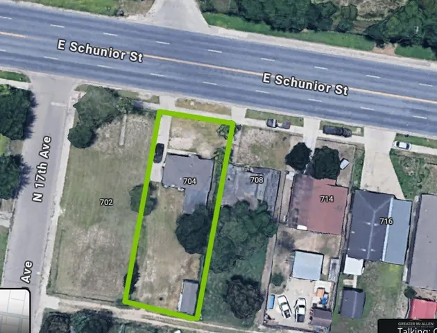 an aerial view of a house with a garden