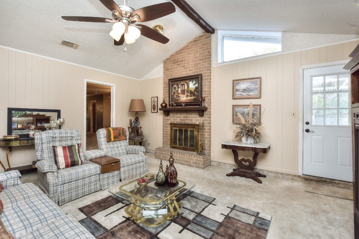 118 Oak Ridge Circle Georgetown, TX 78628 - Photo 14 of 40 a living room with fireplace furniture and a window