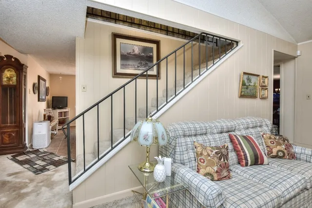 a view of balcony furniture and rug