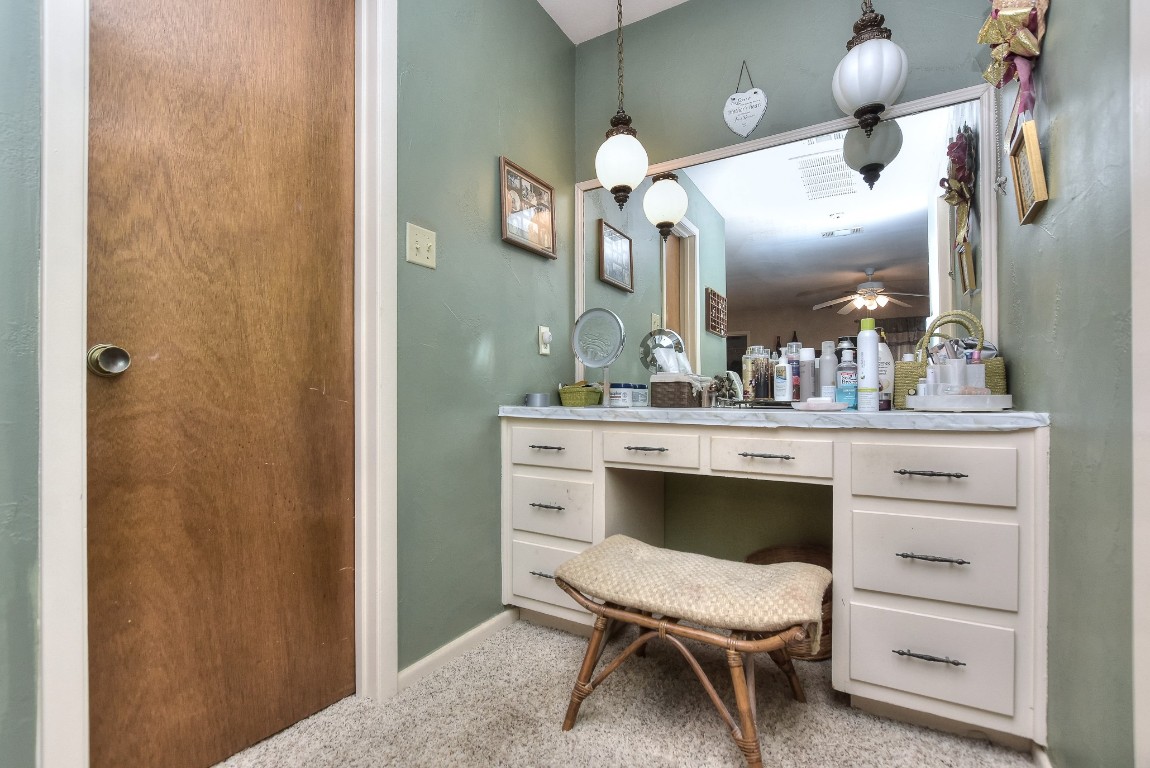 118 Oak Ridge Circle Georgetown, TX 78628 - Photo 18 of 40 a bathroom with a sink and a mirror