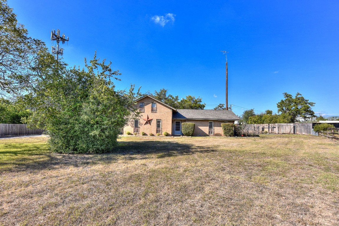 118 Oak Ridge Circle Georgetown, TX 78628 - Photo 2 of 40 a view of a house with a yard