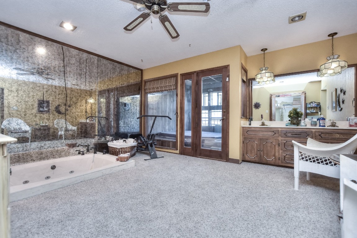 118 Oak Ridge Circle Georgetown, TX 78628 - Photo 25 of 40 a view of a livingroom with furniture and a to ceiling window