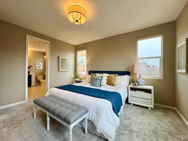 a bathroom with a sink vanity and a mirror