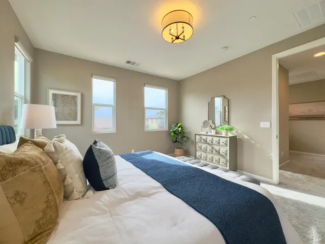 a bathroom with a shower and a sink