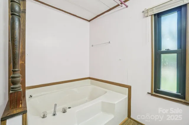 a bathroom with a bathtub