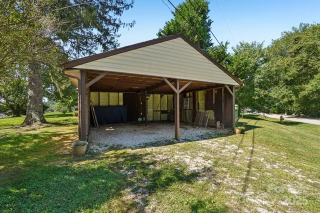 a view of a balcony with wooden floor