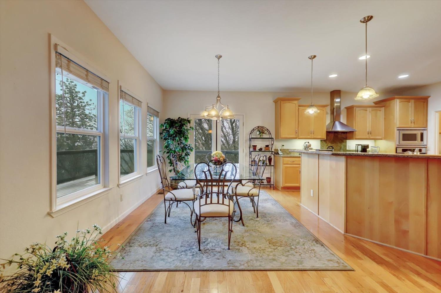 17036 Alice Way Grass Valley, CA 95949 - Photo 11 of 58 a living room with furniture and a chandelier