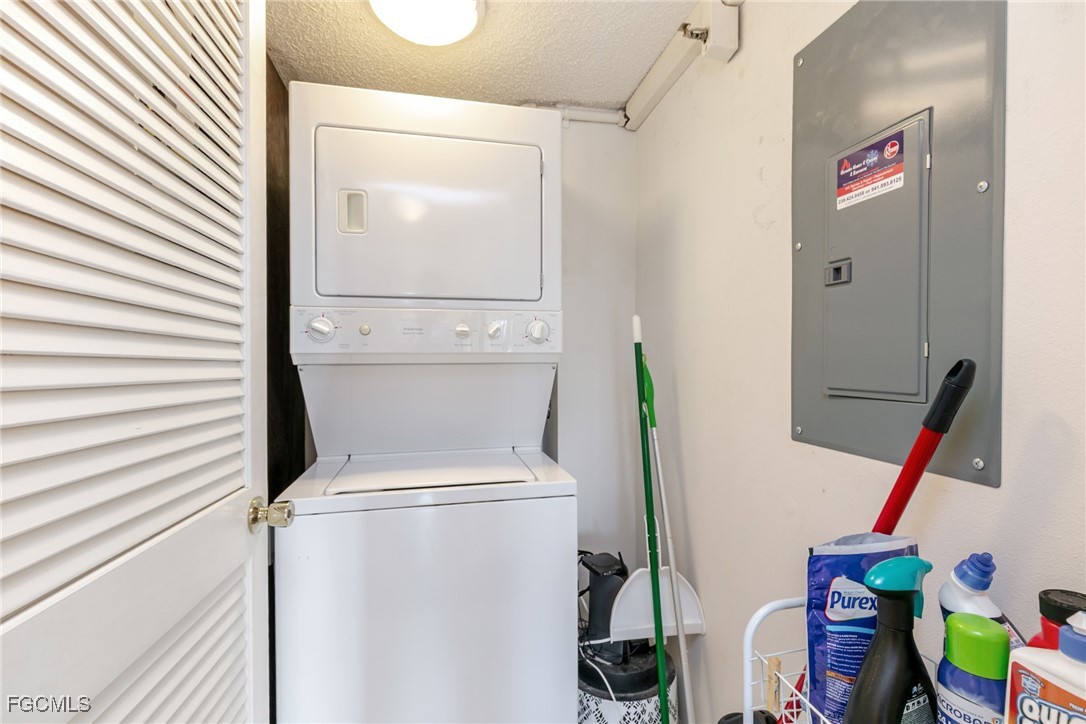 3170 Matecumbe Key Road, Unit 127 Punta Gorda, FL 33955 - Photo 13 of 26 a utility room with dryer and washer