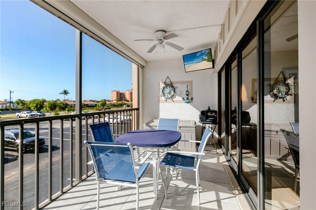 3170 Matecumbe Key Road, Unit 127 Punta Gorda, FL 33955 - Photo 14 of 26 a view of a balcony with furniture