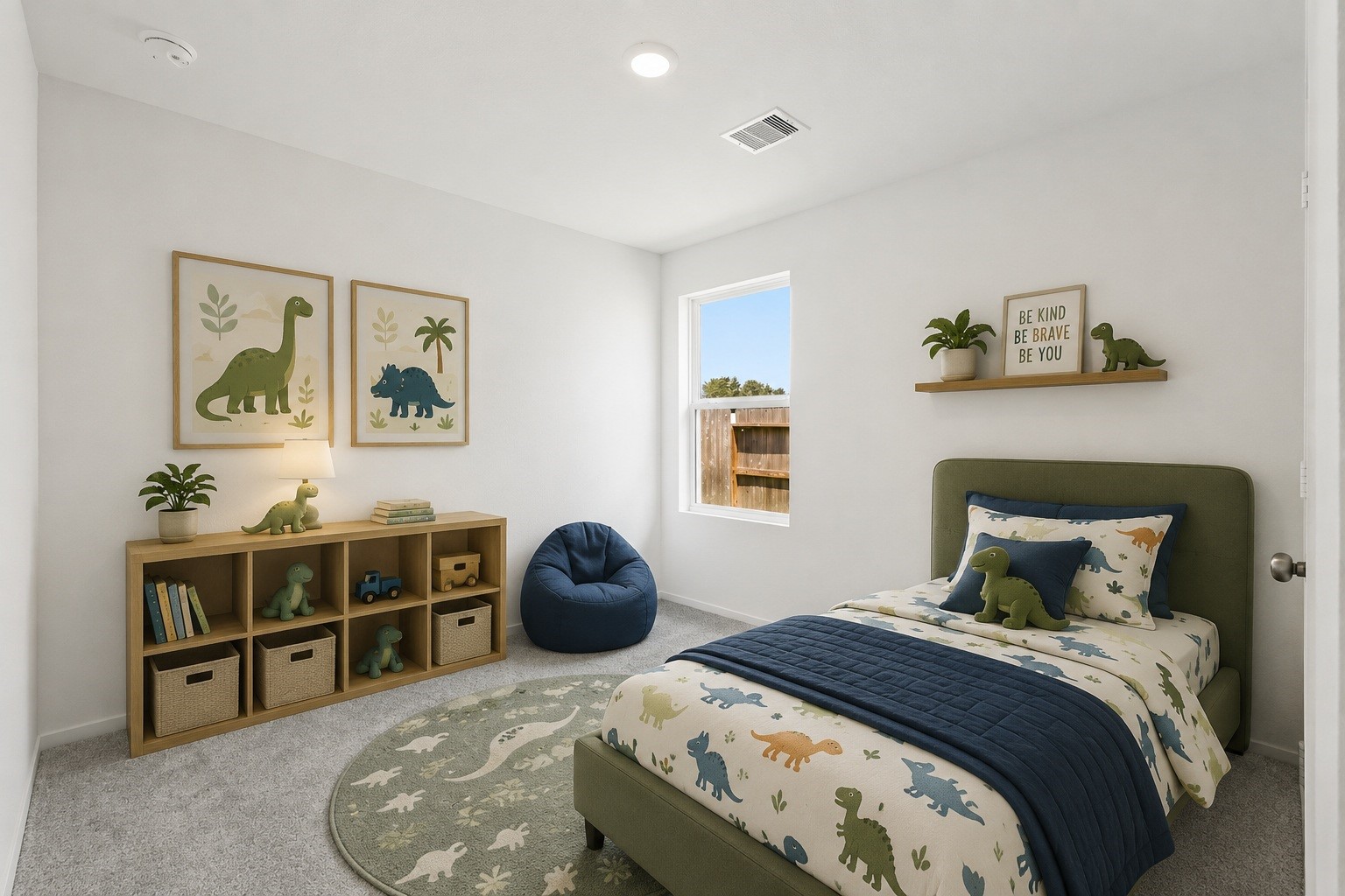 26931 Feather Reed Drive Katy, TX 77493 - Photo 10 of 16 Another spacious secondary bedroom details continuous comfortable carpet flooring, neutral walls, and a large window looking out toward the wood privacy fence line.
