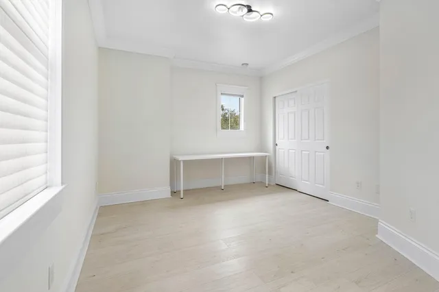 a view of swimming pool with a garden and seating area