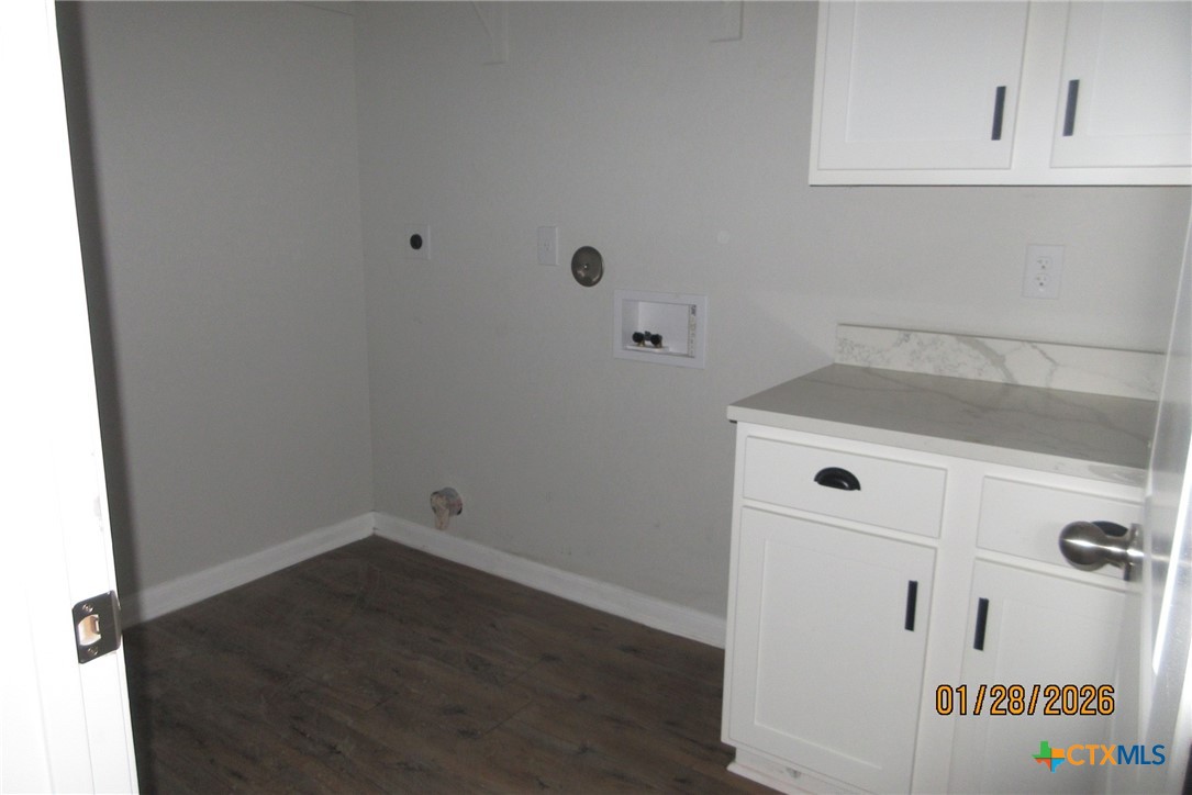7311 Birdsnest Way Temple, TX 76502 - Photo 13 of 25 a bathroom with a sink and cabinets