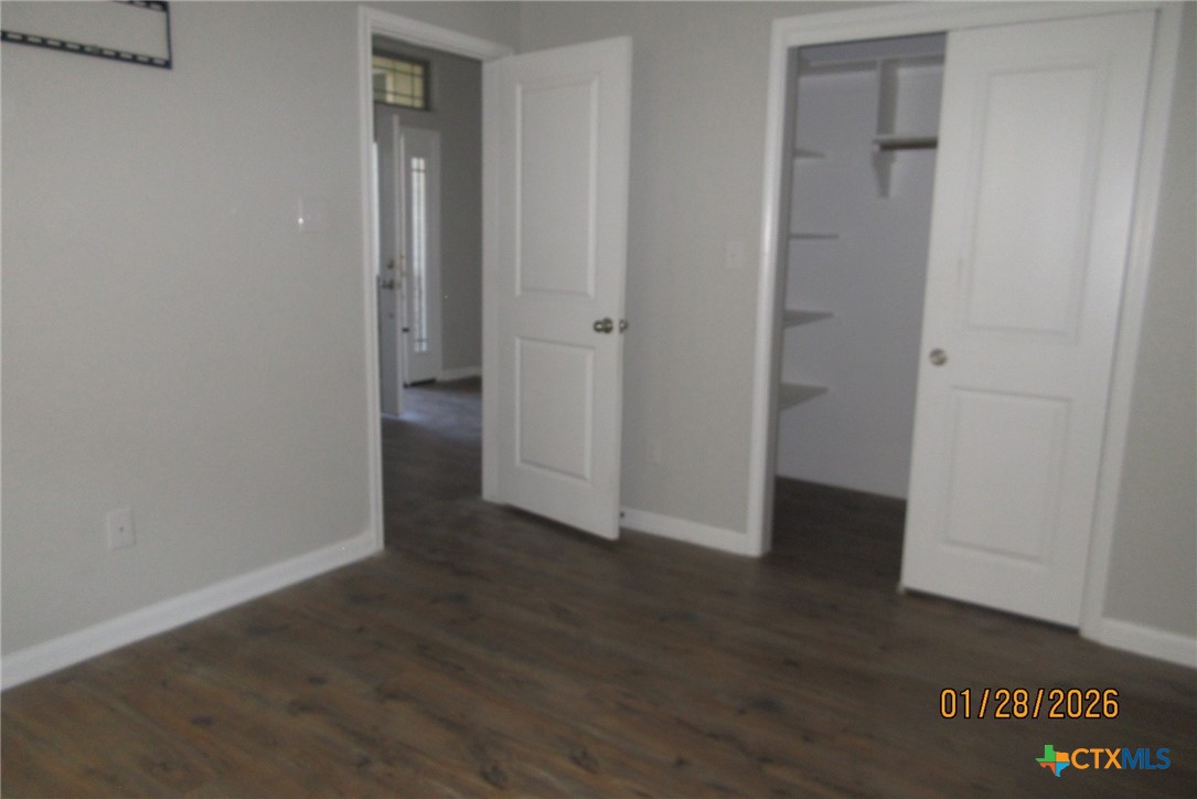 7311 Birdsnest Way Temple, TX 76502 - Photo 8 of 25 an empty room with wooden floor