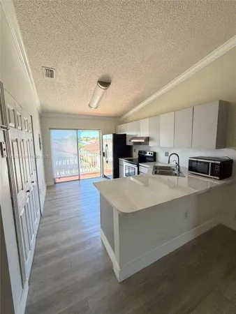 $299,997 | 3375 West 76th Street, Unit 211, Hialeah, FL 33018