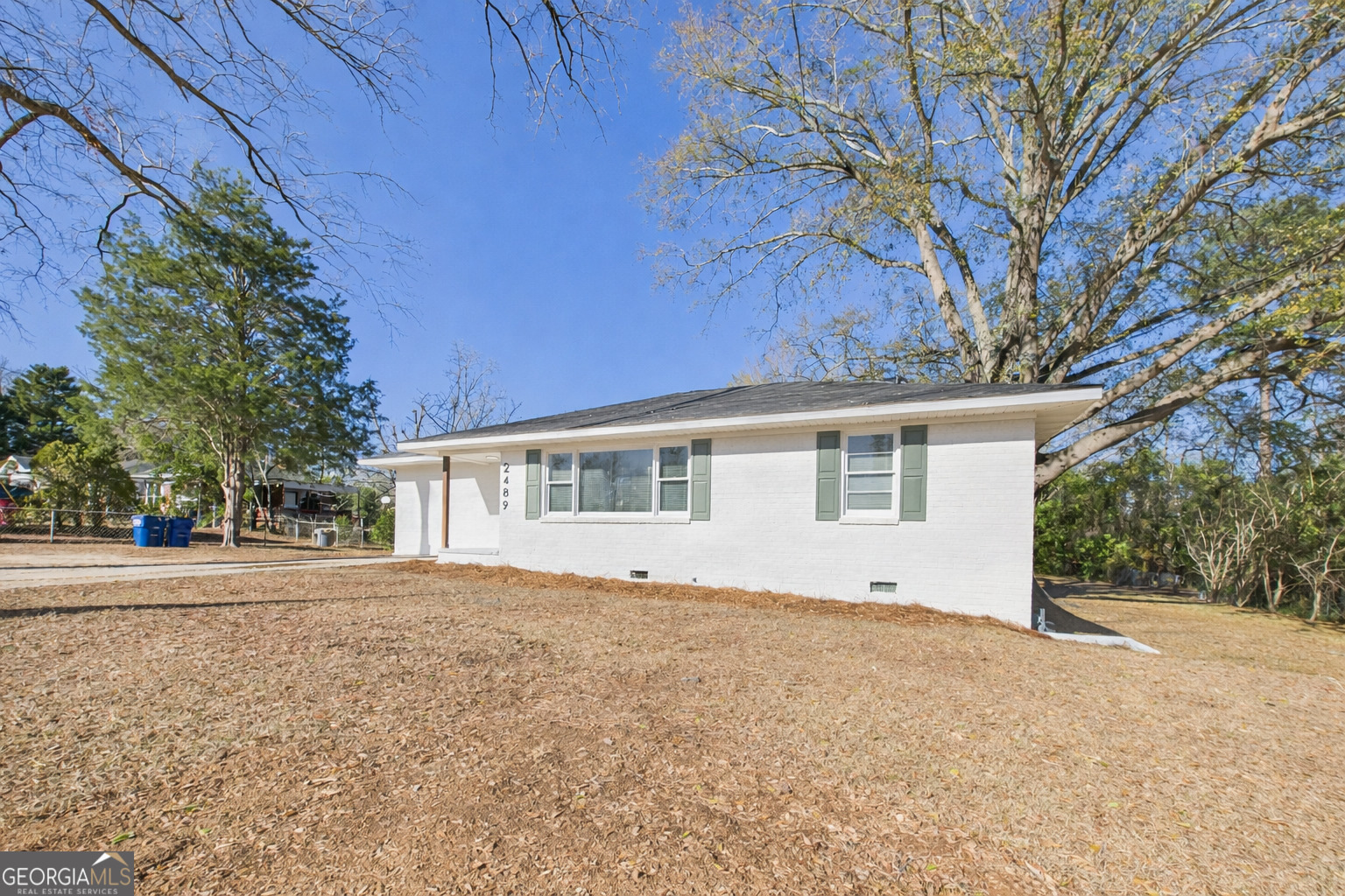 2489 Locksley Drive Macon, GA 31206 - Photo 1 of 42 a view of an house with a yard