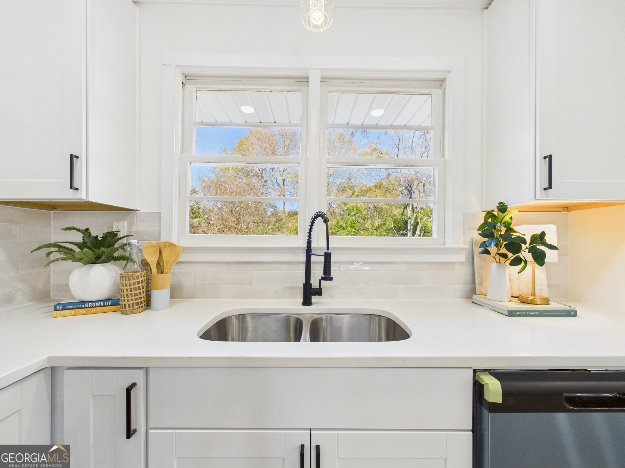 2489 Locksley Drive Macon, GA 31206 - Photo 11 of 42 a kitchen with a sink and a window