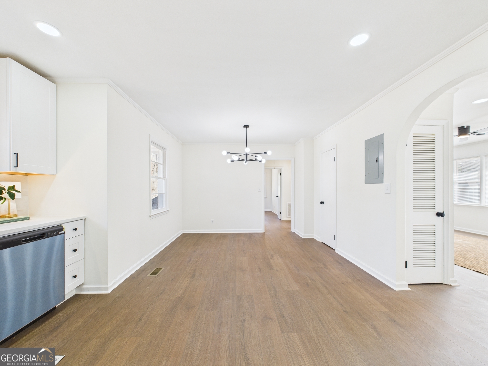 2489 Locksley Drive Macon, GA 31206 - Photo 16 of 42 a view of an empty room with window and cabinet