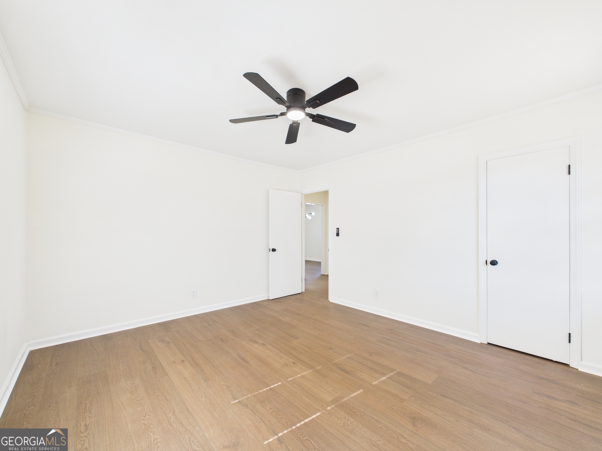 2489 Locksley Drive Macon, GA 31206 - Photo 19 of 42 a view of a ceiling fan and hardwood floor