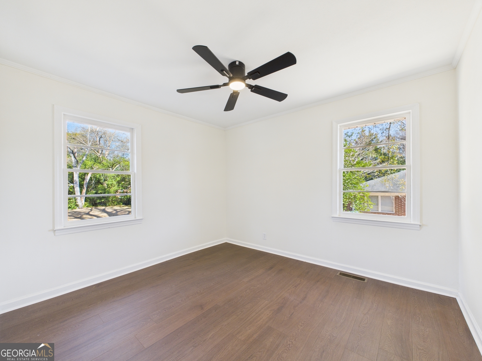2489 Locksley Drive Macon, GA 31206 - Photo 21 of 42 a view of empty room with window and ceiling fan